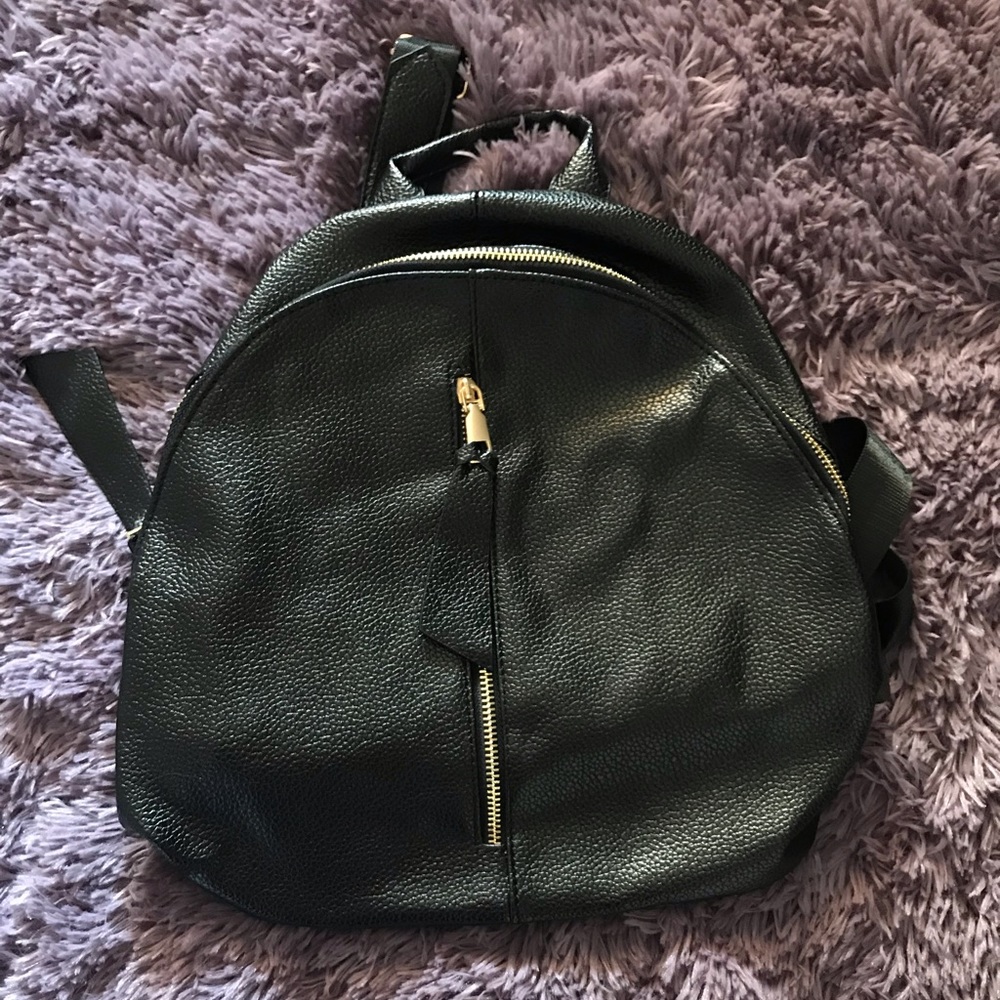Black purse bagpack